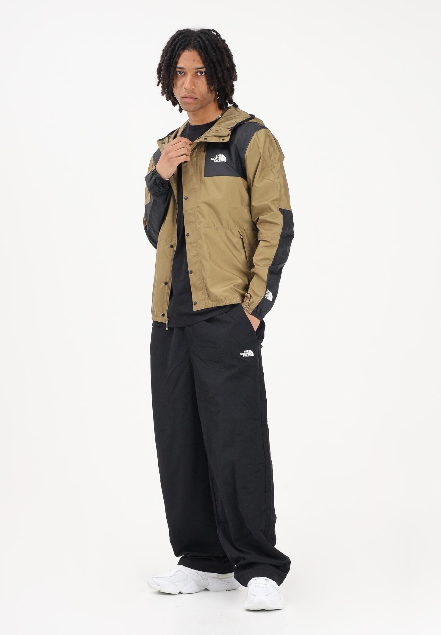 THE NORTH FACE Giacca a vento Reign On kiwi e nero da uomo NF0A5IG32EL1 . THE NORTH FACE 
