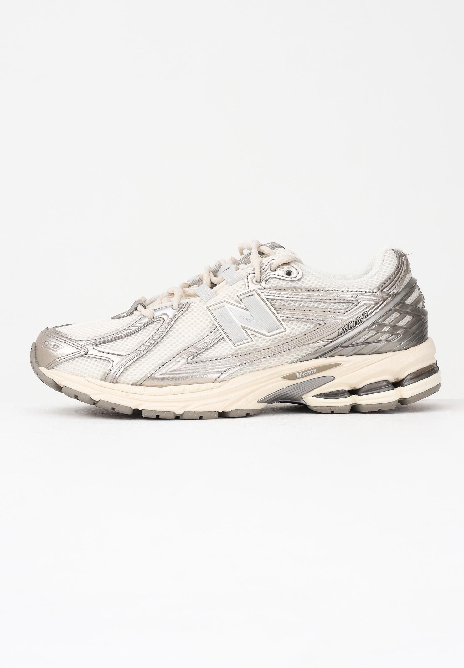 NEW BALANCE Sneakers 1906R panna e argento per uomo e donna U1906RCN . NEW BALANCE 