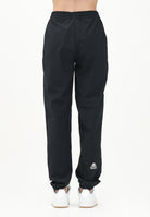THE NORTH FACE Pantalone antivento Mountain Athletics nero da donna NF0A8BGPJK31 . THE NORTH FACE 