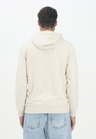 TOMMY HILFIGER Felpa con cappuccio panna da uomo rifinita da logo MW0MW37235ACG  TOMMY HILFIGER 