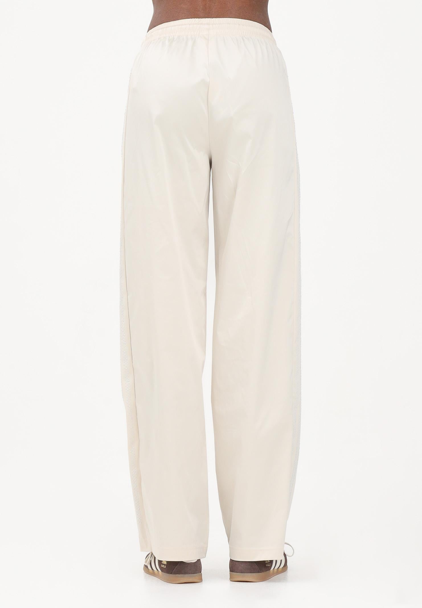 ADIDAS ORIGINALS Pantalone sportivo PEARL FIREBIRD LOOSE panna da donna KE3393 . ADIDAS ORIGINALS 