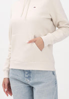 TOMMY JEANS Felpa con cappuccio beige da donna rifinita da logo DW0DW19958ACH . TOMMY JEANS 