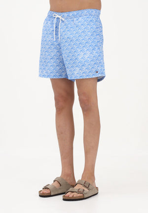 TOMMY HILFIGER Shorts mare azzurro da uomo con fantasia monogram UM0UM03491 0ZY TOMMY HILFIGER 