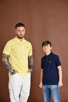 LACOSTE Polo a manica corta gialla per uomo e donna con patch logo coccodrilo 1212 107 LACOSTE 