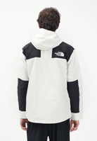THE NORTH FACE Giacca a vento Reign On bianca e nera da uomo NF0A8B5GROU1  THE NORTH FACE 