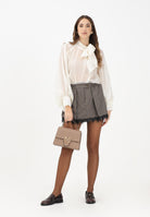 VICOLO Gonna corta da donna realizzata in tessuto principe di Galles nei toni del marrone e nero TF1473 SC VICOLO 