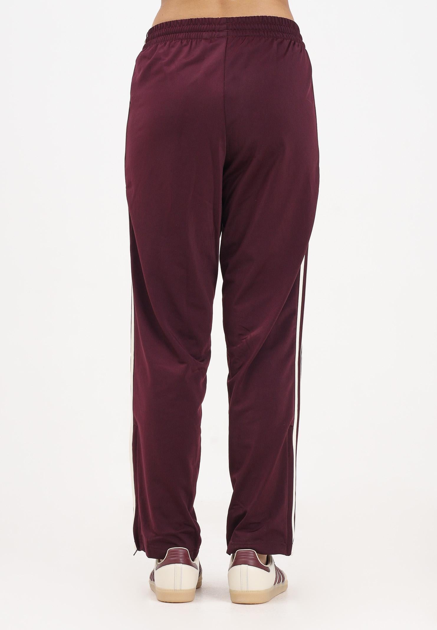 ADIDAS ORIGINALS Pantalone sportivo adicolor Classics Firebird bordeaux da donna KG1553  ADIDAS ORIGINALS 