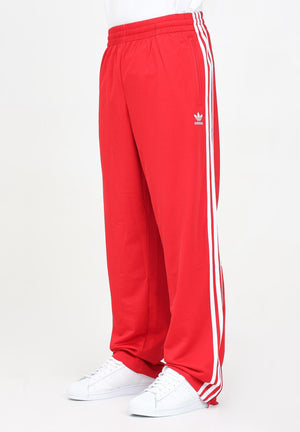 ADIDAS ORIGINALS Pantalone sportivo adicolor Classics Firebird rosso da uomo IJ7057 . ADIDAS ORIGINALS 
