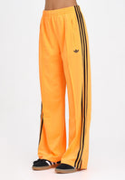 ADIDAS ORIGINALS Pantalone sportivo Adicolor Classic Firebird Loose arancione fluo da donna JY2694 . ADIDAS ORIGINALS 