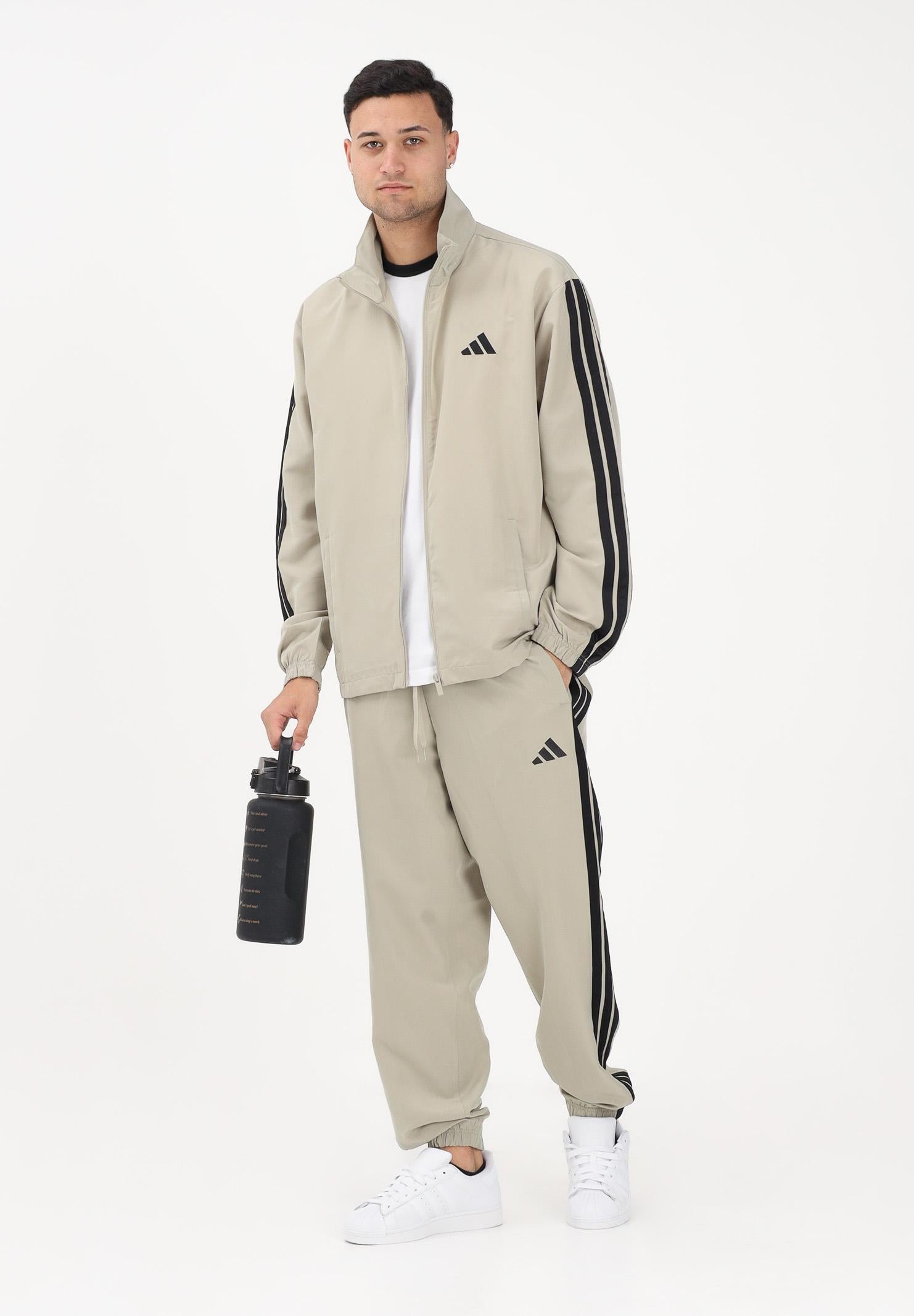 ADIDAS PERFORMANCE Tuta 3 STRIPES WOVEN sabbia da uomo JY7720 . ADIDAS PERFORMANCE 