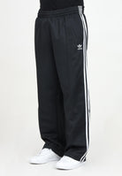 Pantalone sportivo Adicolor Baggy Fit Firebird nero da uomo IZ4801 . ADIDAS ORIGINALS 