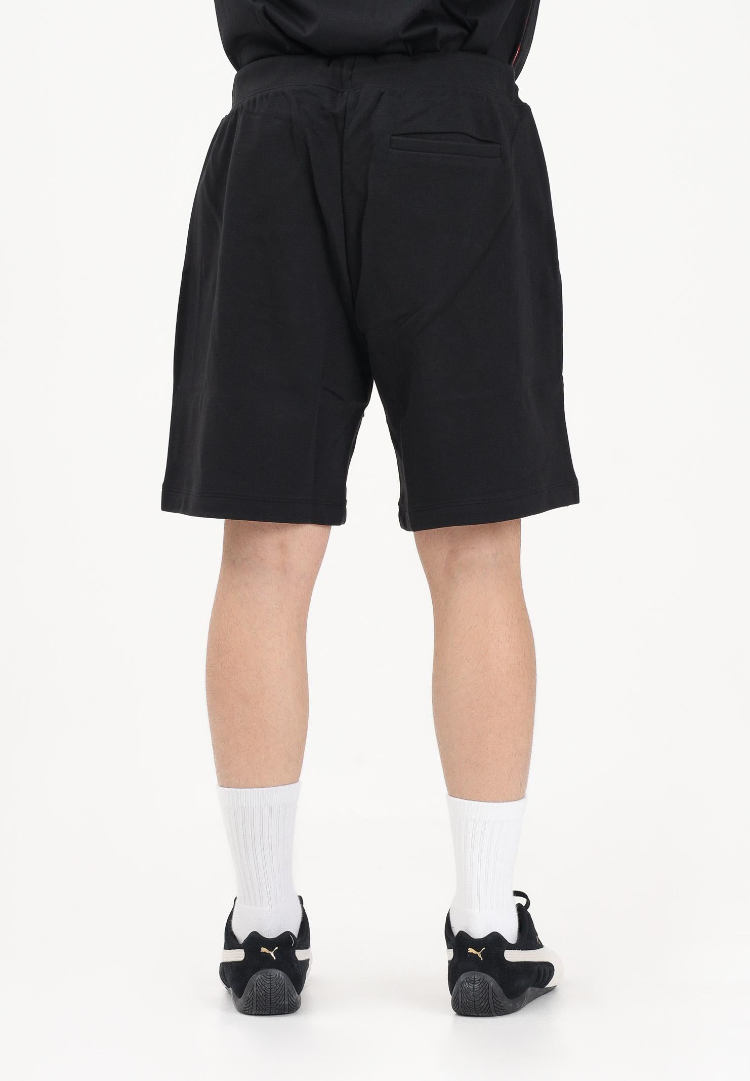 TOMMY HILFIGER Shorts sportivo nero da uomo con banda laterale logata MW0MW42883 BDS TOMMY HILFIGER 