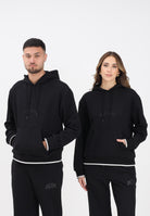 GCDS Felpa con cappuccio nera per uomo e donna rifinita da logo impresso B2EW1905JD1 99 GCDS 