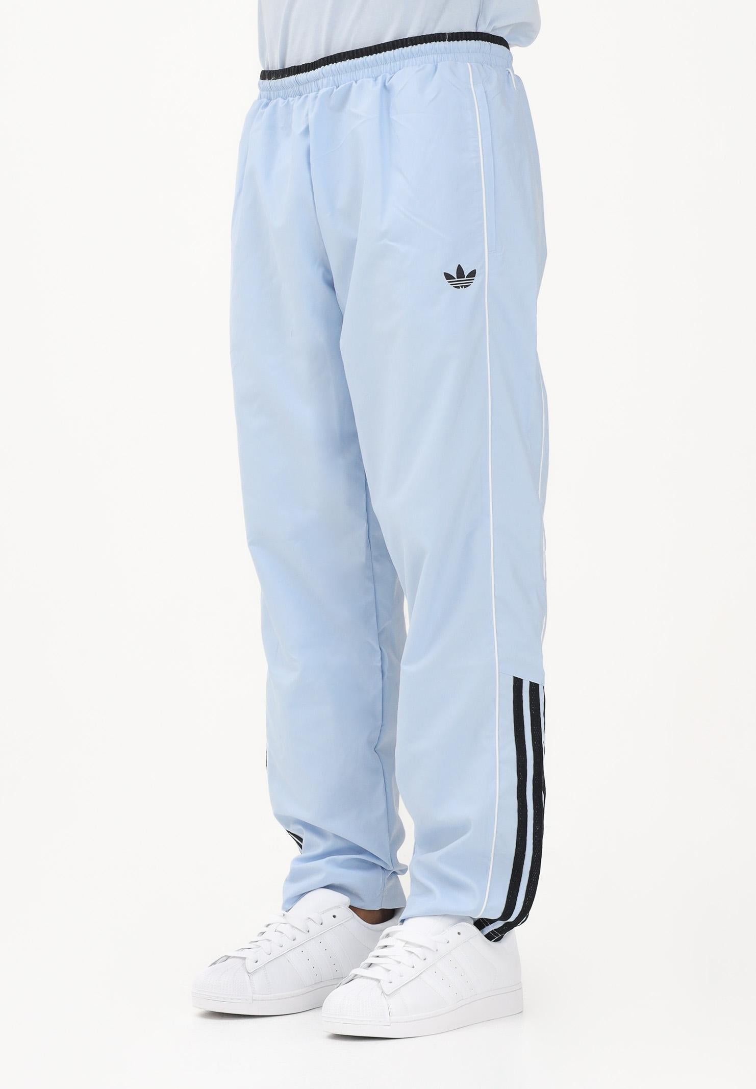 ADIDAS ORIGINALS Pantalone sportivo HALF STRIPES celeste da uomo KE2165 . ADIDAS ORIGINALS 