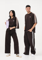 ADIDAS ORIGINALS Jeans FIREBIRD marrone per uomo e donna KD2934 . ADIDAS ORIGINALS 