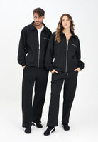 GCDS Pantalone sportivo nero per uomo e donna con lavorazione jacquard del logo B2CM3010TQ6 99 GCDS 
