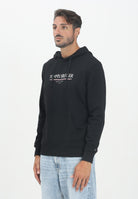 TOMMY HILFIGER Felpa con cappuccio nera da uomo rifinita da stampa logo MW0MW40534BDS  TOMMY HILFIGER 