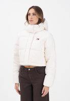 TOMMY JEANS Piumino panna da donna con logo DW0DW21624YBH  TOMMY JEANS 