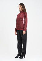 PUMA Tuta Poly bordeaux e nera da donna 688159 96 PUMA 