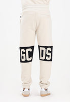 GCDS Pantalone sportivo panna per uomo e donna con banda logo a contrasto B1XM3001JD1 09 GCDS 