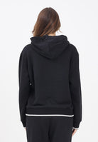 GCDS Felpa con cappuccio nera per uomo e donna rifinita da logo impresso B2EW1905JD1 99 GCDS 