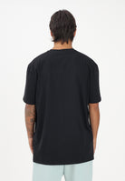 GCDS T-shirt a manica corta nera per uomo e donna con stampa logo C1MEQC041J104 999G GCDS 
