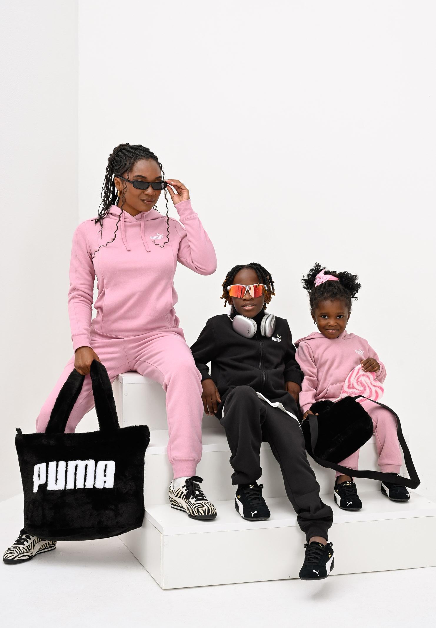 PUMA Tuta Essential nera per bambino e bambina 691934 01 PUMA 