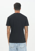 TOMMY JEANS T-shirt a manica corta nera da uomo con logo DM0DM21911BDS . TOMMY JEANS 