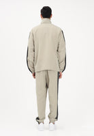 ADIDAS PERFORMANCE Tuta 3 STRIPES WOVEN sabbia da uomo JY7720 . ADIDAS PERFORMANCE 
