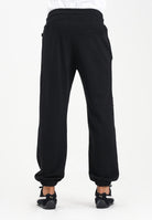 GCDS Pantalone sportivo nero per uomo e donna con inserto e logo B1XM3003JI1 99 GCDS 