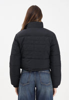 TOMMY JEANS Piumino nero da donna con logo DW0DW21620BDS  TOMMY JEANS 