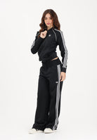 ADIDAS ORIGINALS Pantalone sportivo Smocked Firebird nero da donna KD0301 . ADIDAS ORIGINALS 
