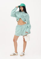 CALVIN KLEIN Shorts verdi e bianchi da donna con motivo a righe LV00QS7604 4ZF CALVIN KLEIN 
