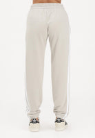 ADIDAS PERFORMANCE Pantalone sportivo Essentials 3-Stripes French Terry Cuffed beige da donna JE0049 . ADIDAS PERFORMANCE 