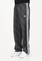 ADIDAS ORIGINALS Pantalone sportivo FIREBIRD LOOSE MONOGRAM nero da uomo KC9159 . ADIDAS ORIGINALS 