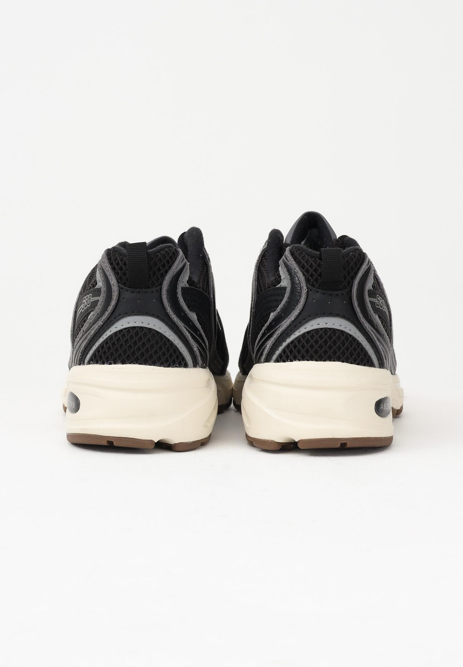 NEW BALANCE Sneakers 530 nere per uomo e donna U5309TN . NEW BALANCE 