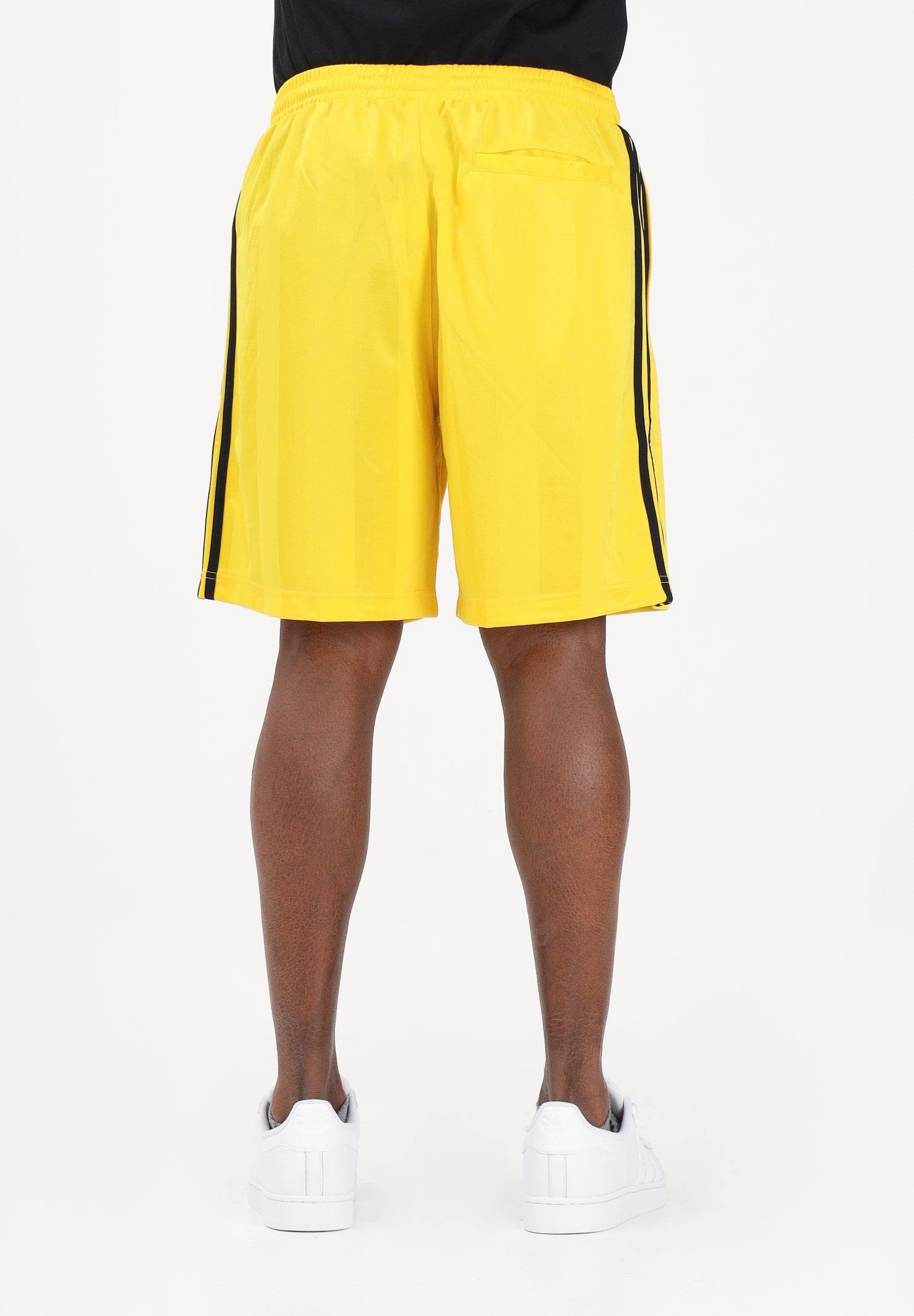 ADIDAS ORIGINALS Shorts sportivo 3 Stripes Loose Engineered giallo da uomo KE3592 . ADIDAS ORIGINALS 