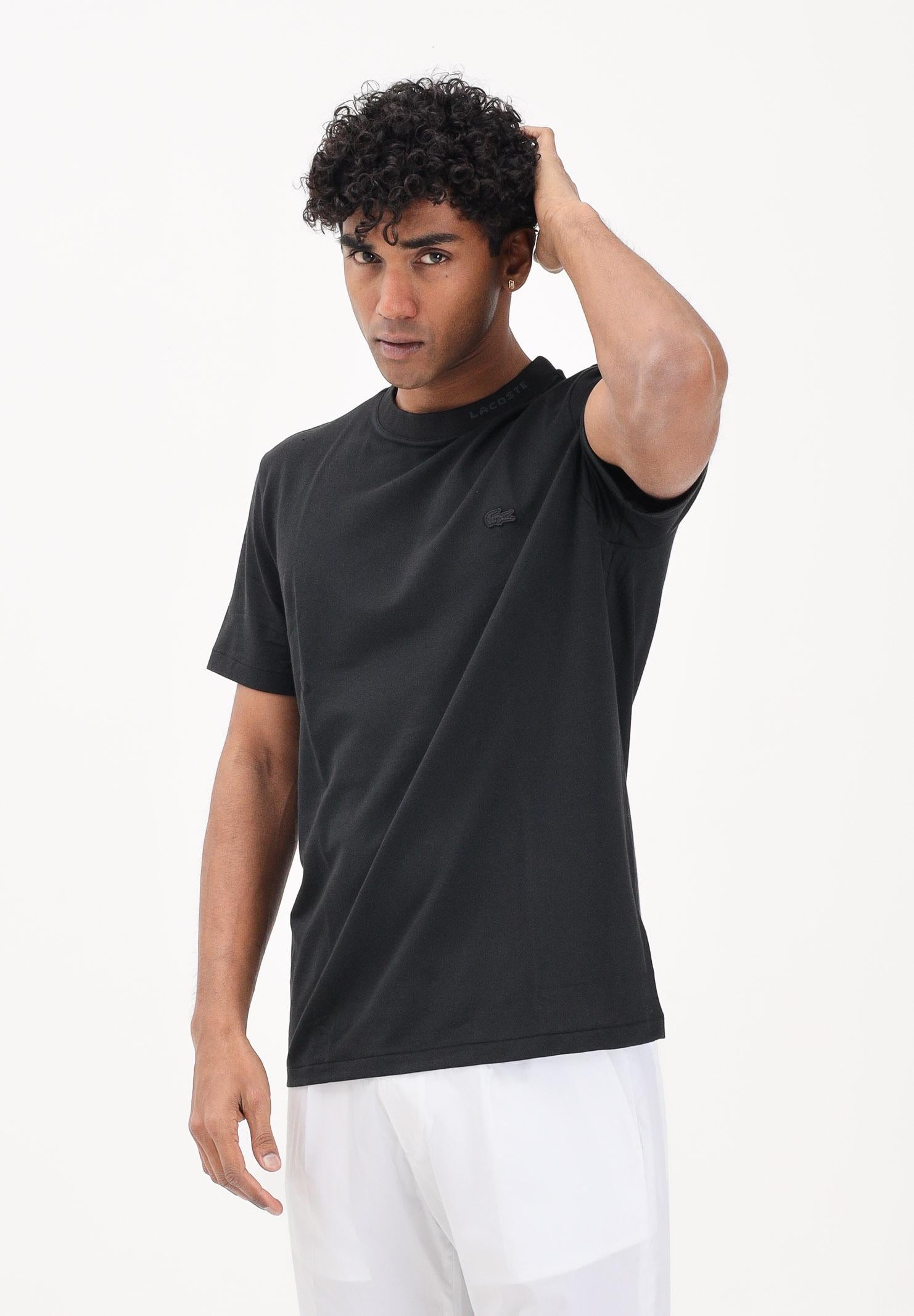 LACOSTE T-shirt a manica corta nera da uomo in piqué con marchio jacquard TH5060 031 LACOSTE 