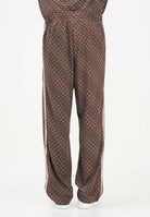 ADIDAS ORIGINALS Pantalone sportivo FIREBIRD LOOSE MONOGRAM marrone per uomo e donna KE1678 . ADIDAS ORIGINALS 