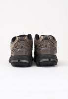 NEW BALANCE Sneakers 1906R nere, beige e oro da uomo U1906RCJ . NEW BALANCE 