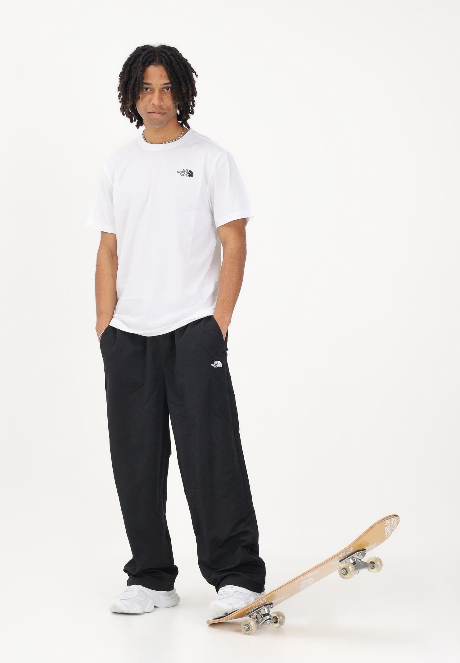 THE NORTH FACE Pantalone TNF Easy Wind nero da uomo NF0A8FBMJK31 . THE NORTH FACE 
