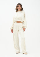 HINNOMINATE Pantalone sportivo panna da donna con nervature laterali HMABW01995 BI04 HINNOMINATE 