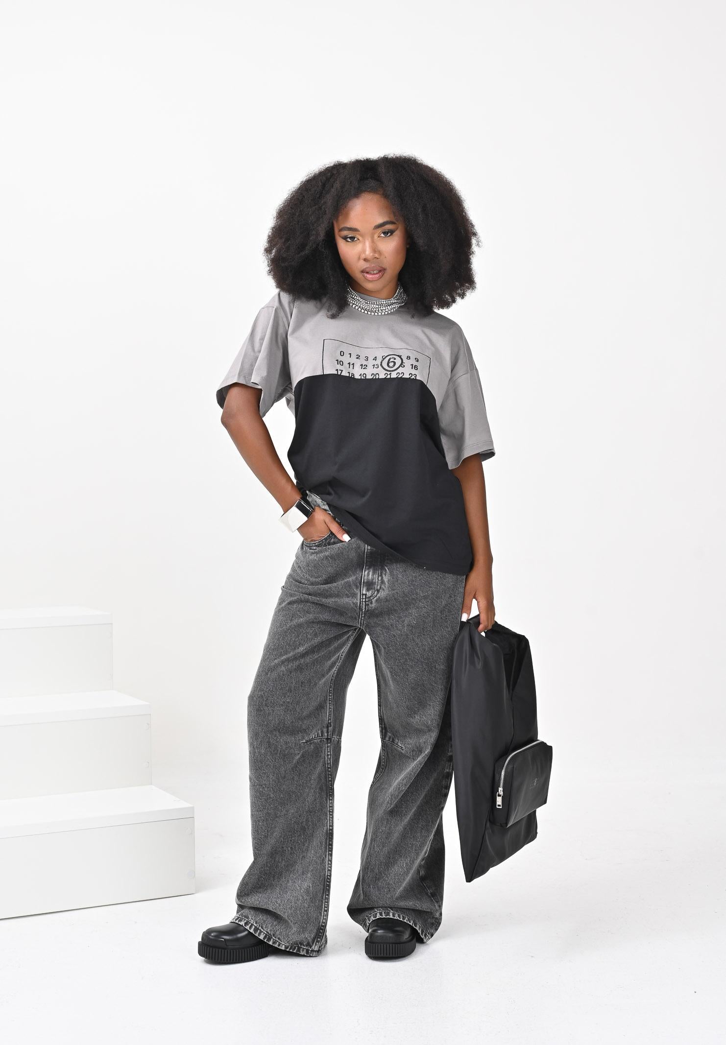 MAISON MARGIELA T-shirt a manica corta nera e grigia per donna, ragazzi e bambini caratterizzata da una costruzione re-cut M60876MM04I M6C37 MAISON MARGIELA 