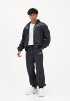 MARCELO BURLON COUNTY OF MILAN Pantalone sportivo nero da uomo con logo S6CMMAPA076 110 MARCELO BURLON COUNTY OF MILAN 