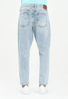 TOMMY JENAS Jeans in denim chiaro da uomo dal taglio relaxed fit DM0DM212111A5  TOMMY JEANS 