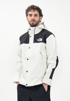 THE NORTH FACE Giacca a vento Reign On bianca e nera da uomo NF0A8B5GROU1  THE NORTH FACE 