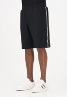 EA7 Shorts sportivo nero da uomo con bande logate laterali 7M001481AF12660 UC001 EA7 
