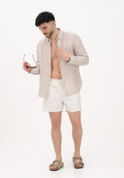 TOMMY HILFIGER Shorts mare panna da uomo con logo UM0UM03477 Z00 TOMMY HILFIGER 