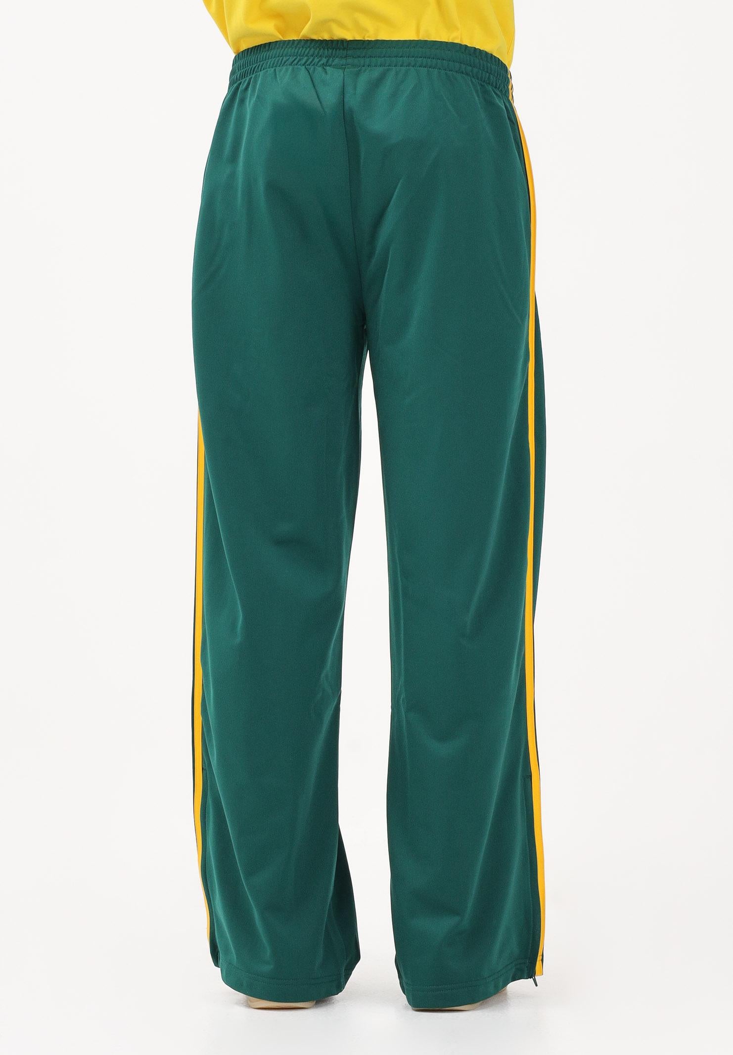 ADIDAS ORIGINALS Pantalone sportivo FIREBIRD LOOSE verde e giallo da uomo KG3707 . ADIDAS ORIGINALS 