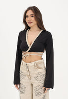 F**K Top nero da donna con intreccio FK26-SW0457BK . F**K 